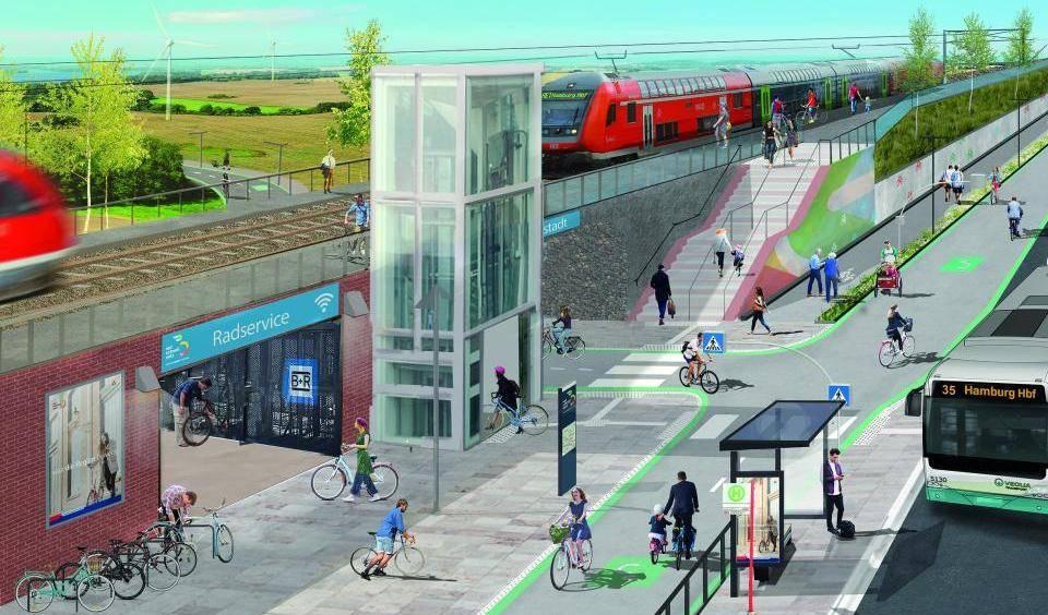 Bahnhof des Regionalverkhrs, der in der Ebene +1 liegt mit einem seitlich angeordneten Aufzug. Zum Eingang gehen viele Radfahrer. An einer Bushaltestelle hält ein Bus der Linie 36 Richtung Hamburg Hauptbahnhof, viele Radfahrer und Fußgänger unterwegs